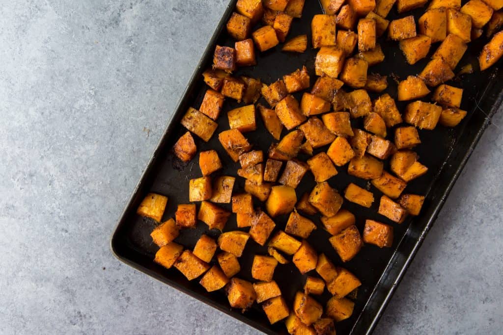Roasted squash out of the oven on a cookie sheet