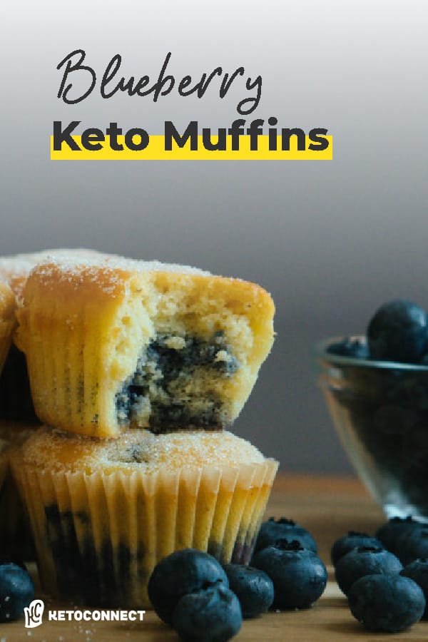 blueberry muffin stacked on top of each other with a bite out of it