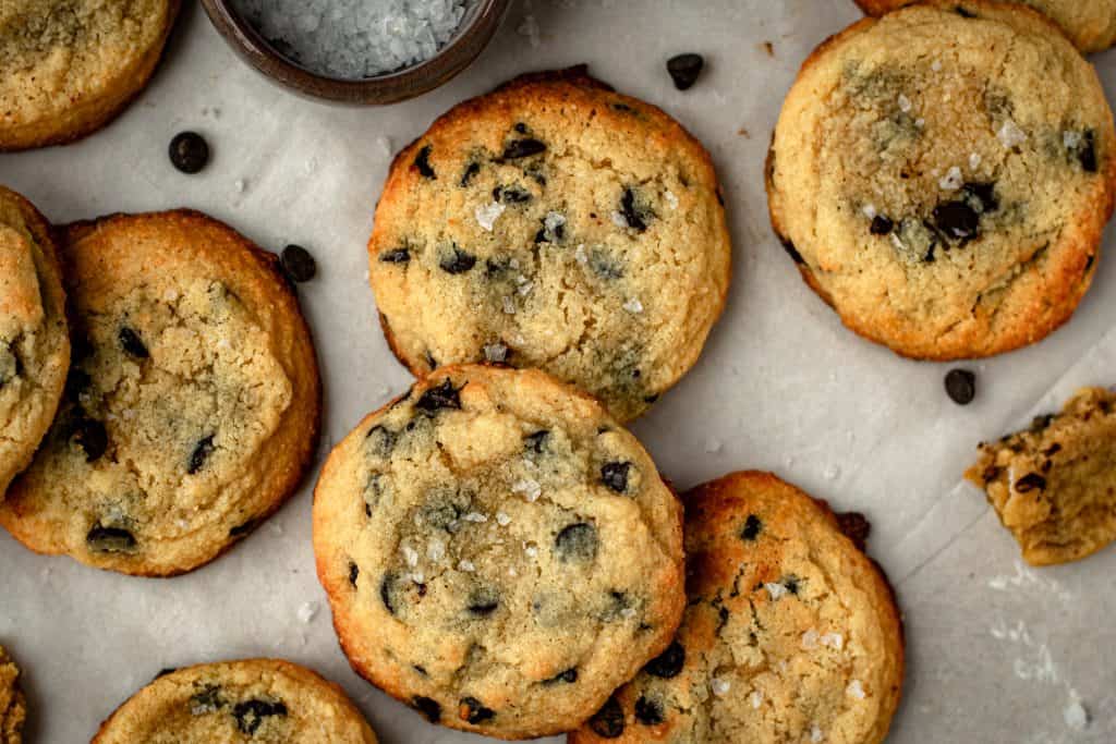 Keto Chocolate Chip Cookies Tray of cookies next to flakey salt.
