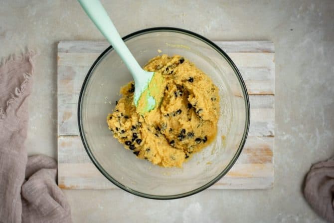 Chocolate chips folded into the raw cookie dough