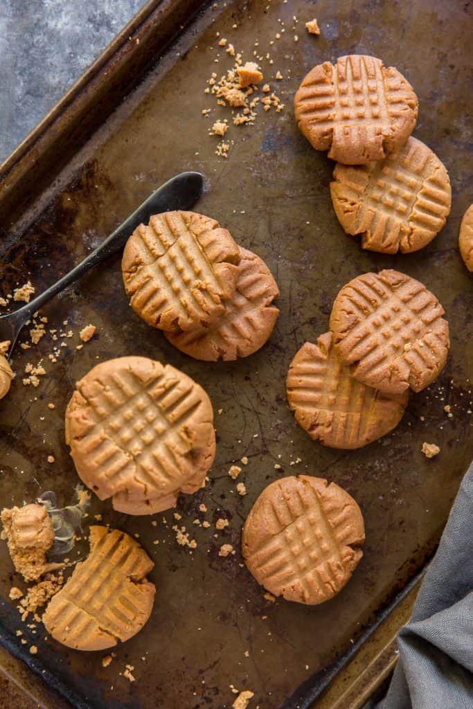 Keto Peanut Butter Cookies Peanut Butter Cookies on a baking pan fresh from the oven