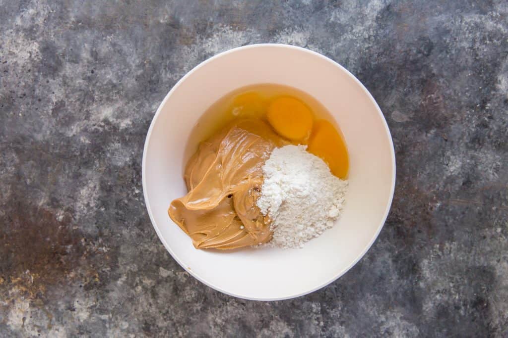 All Peanut Butter Cookie Ingredients in a bowl to mix together