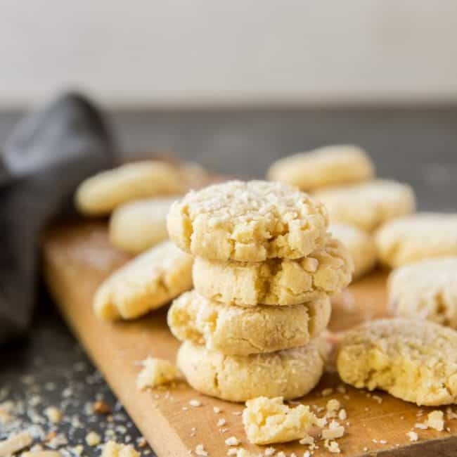 Keto Oatmeal Cookies Oatmeal cookies stacked on a cutting board