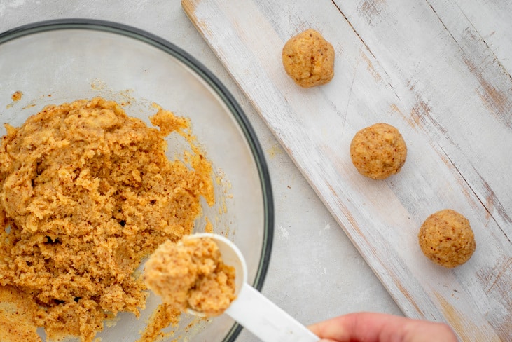 Creating even doughnuts with a white tablespoon