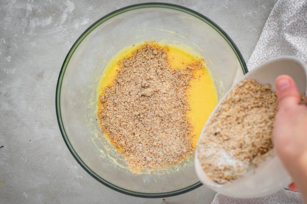 Keto Waffles Sprinkling in the dry to wet ingredients