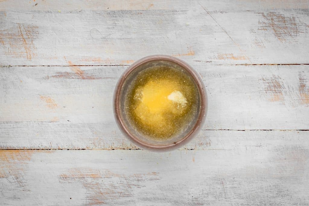 a bowl with gelatin and water set to bloom