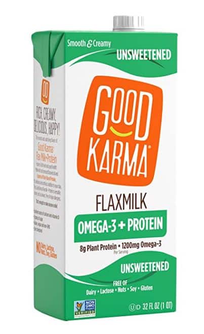 keto milk half gallon container of flax milk on white background