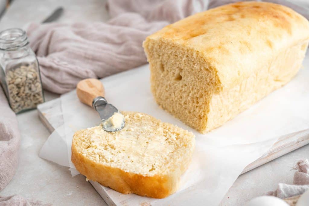 keto bread with a silver butter knife. 