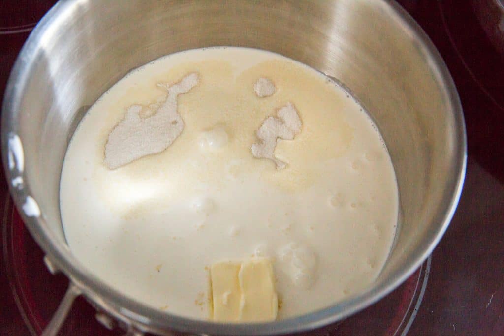 Butter, heavy cream, and erythritol in a stainless steel pot to boil