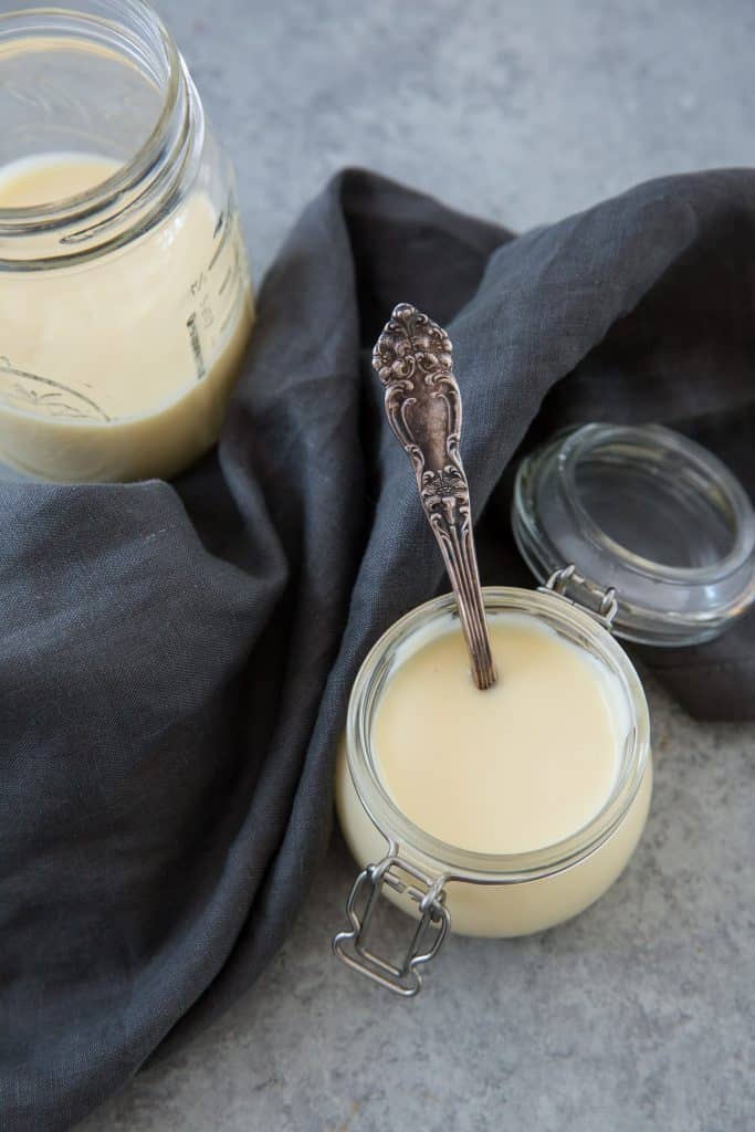 Two jars of freshly made sweetened condensed milk 