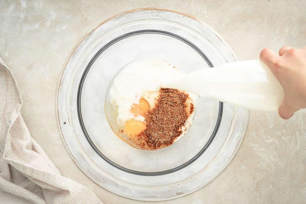 Keto Fried Chicken Ingredients for the marinade added into a glass bowl