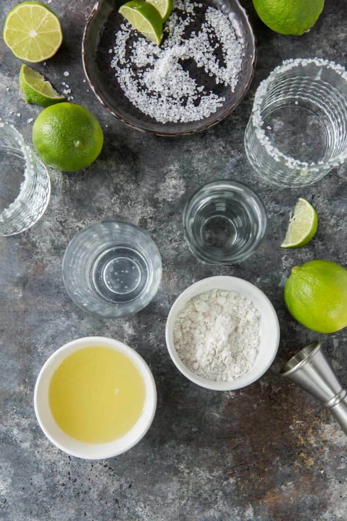 Keto Margarita All glasses and ingredients to make keto margaritas with fresh lime juice.