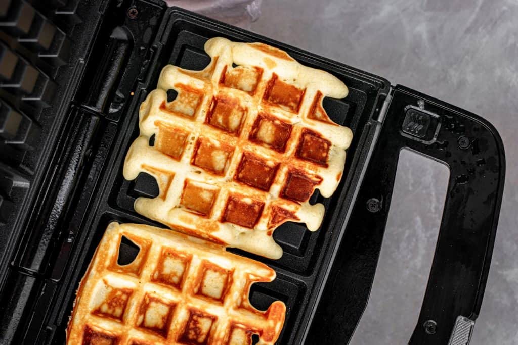 Cooked protein waffles ready to be removed from the iron