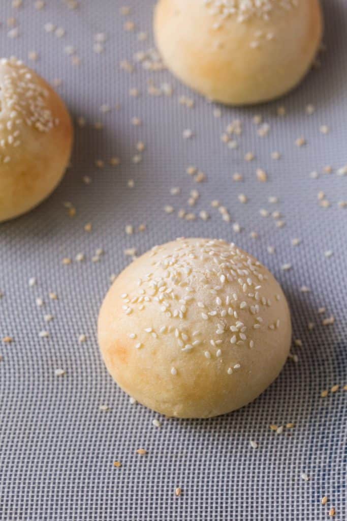 The baked hamburger buns out of the oven