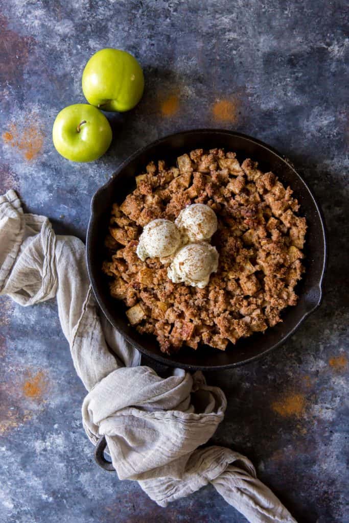 Keto Apple Crisp A thin gray towel covering the hot cast iron handle
