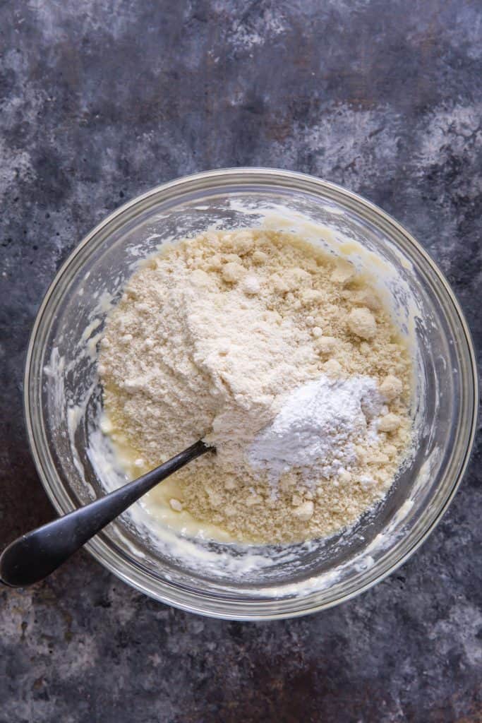 the keto flour being mixed into the hamburger bun dough