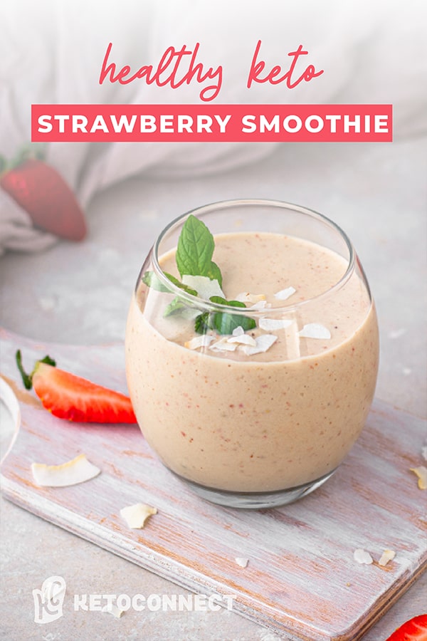 glass of strawberry smoothie with napkin in background