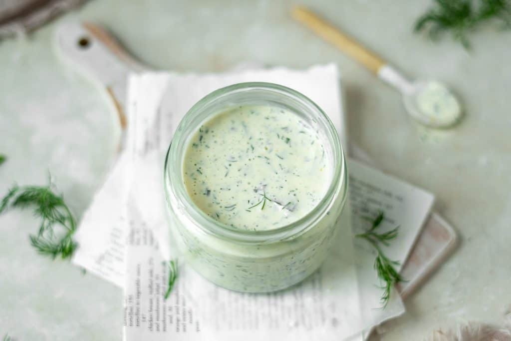 A jar filled with keto ranch dressing