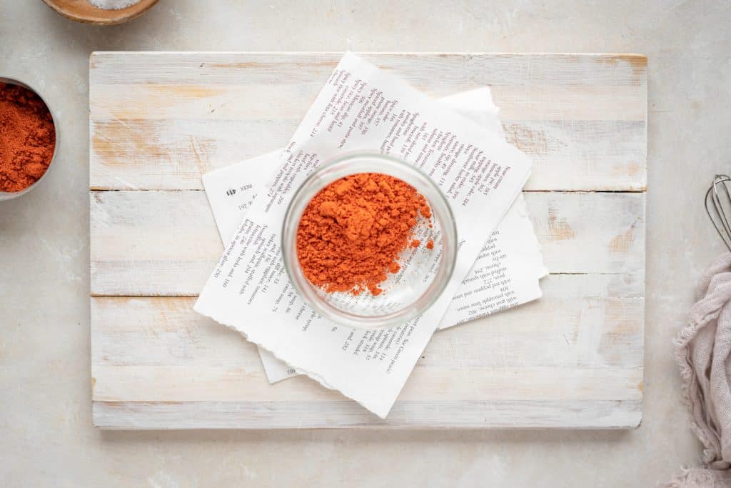 Keto taco seasoning Chili powder and paprika in a jar