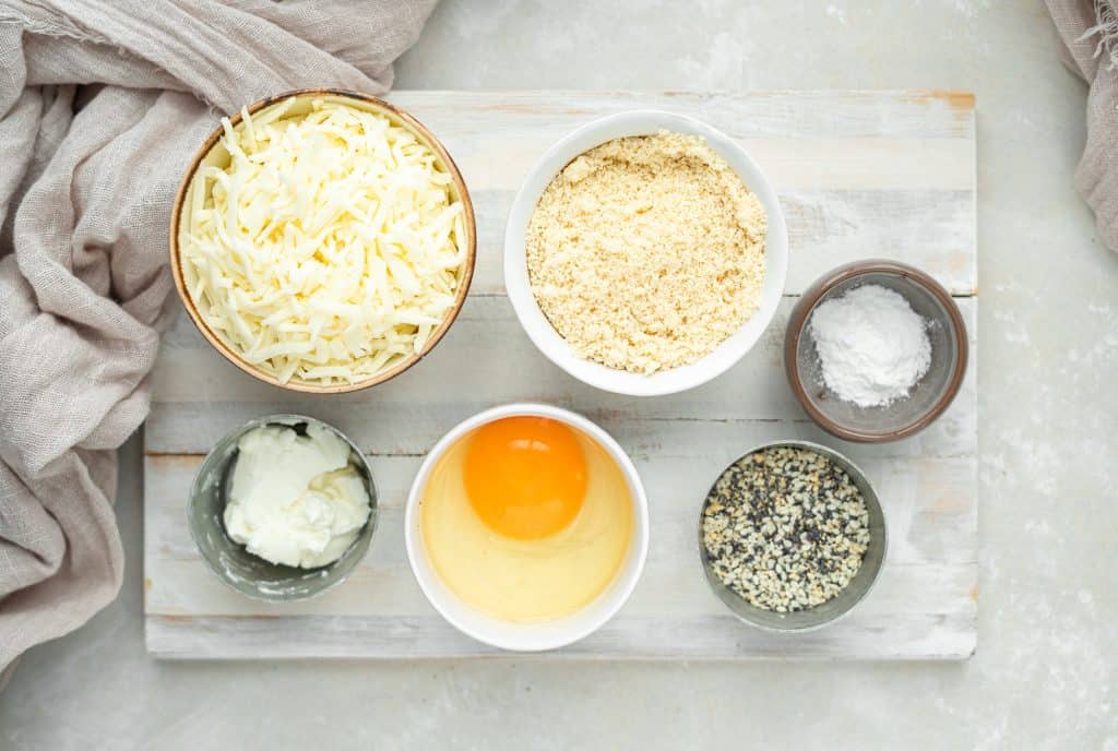 keto bagels all the ingredients needed for this bagel recipe on a cutting board