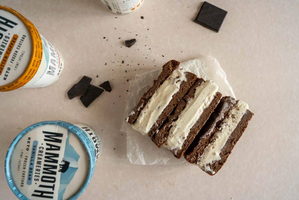 Keto Ice Cream Sandwich mammoth creameries ice cream pints next to three ice cream sandwiches
