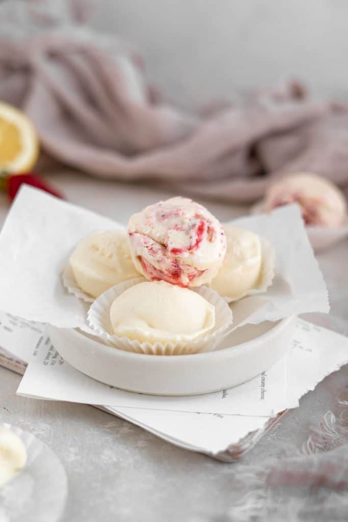 Keto Cheesecake Fat Bombs A vertical image of cheesecake fat bombs