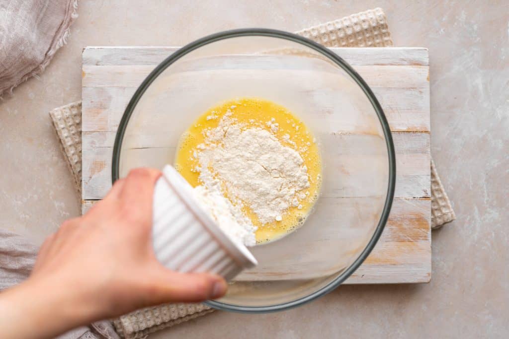 Adding protein powder to the eggs