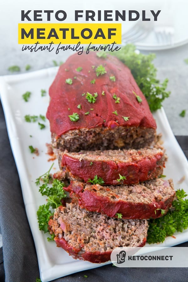 Keto Meatloaf meatloaf that is sliced on a white platter and ready for dinner