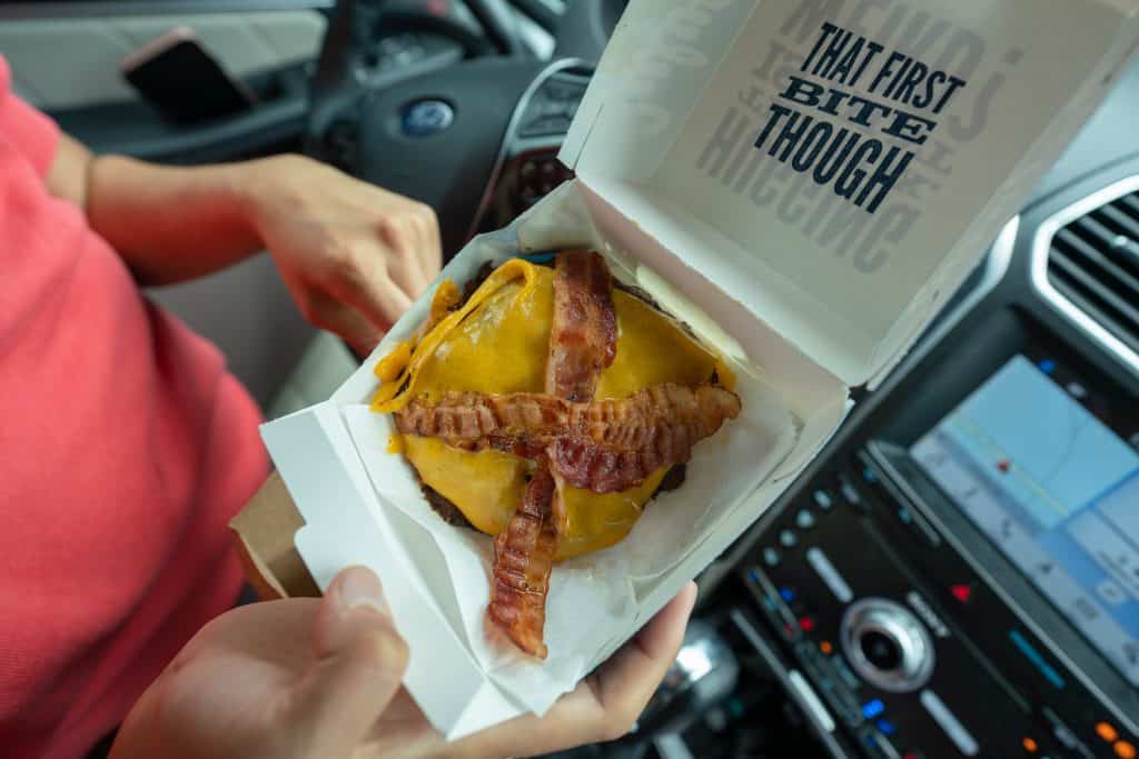 double bacon butterburger from culvers in a to go box