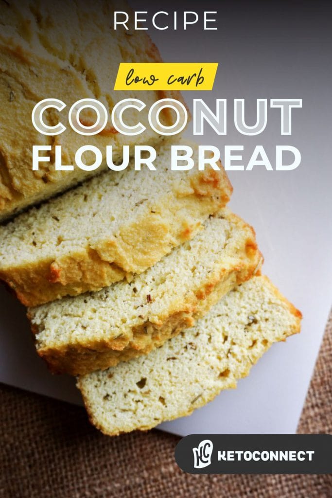 keto coconut flour bread coconut flour bread sliced on a cutting board with rosemary