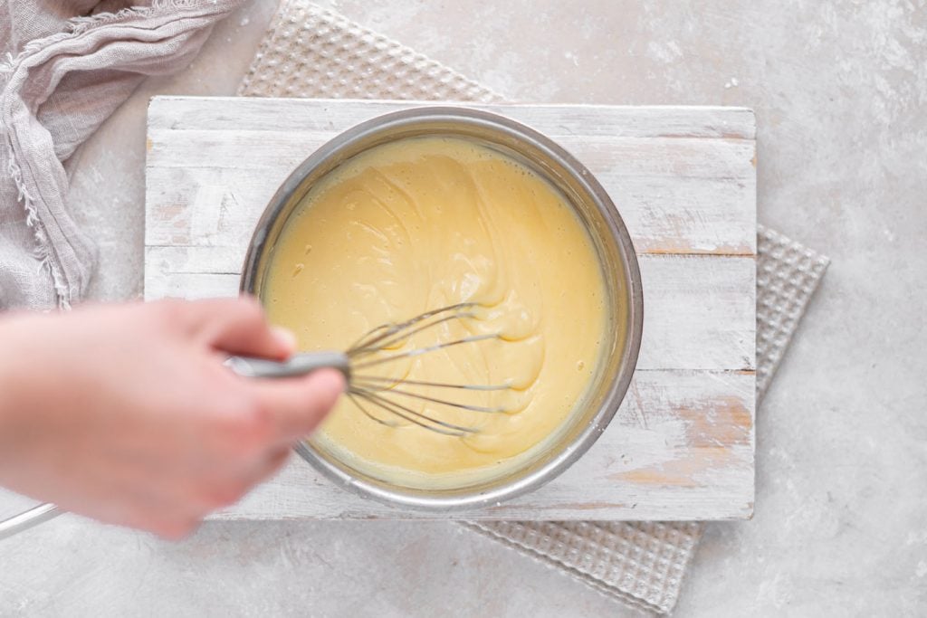 almond milk being simmered in a saucepan