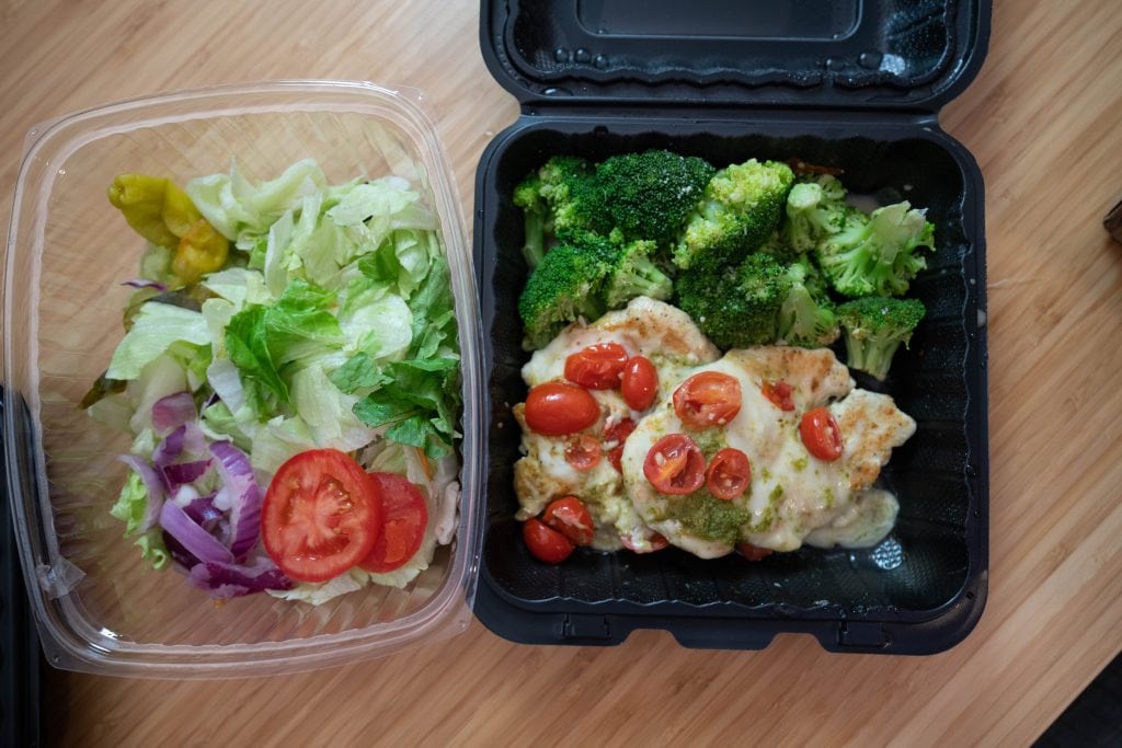 olive garden keto side salad shown with an entree from olive garden