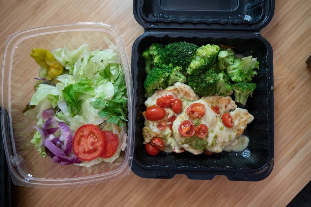 side salad shown with an entree from olive garden