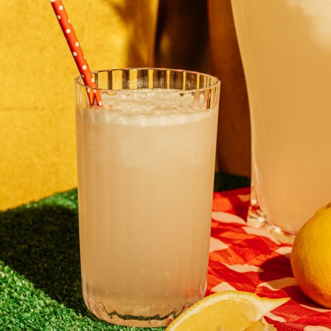 sugar free lemonade pitcher of lemonade being poured into a glass