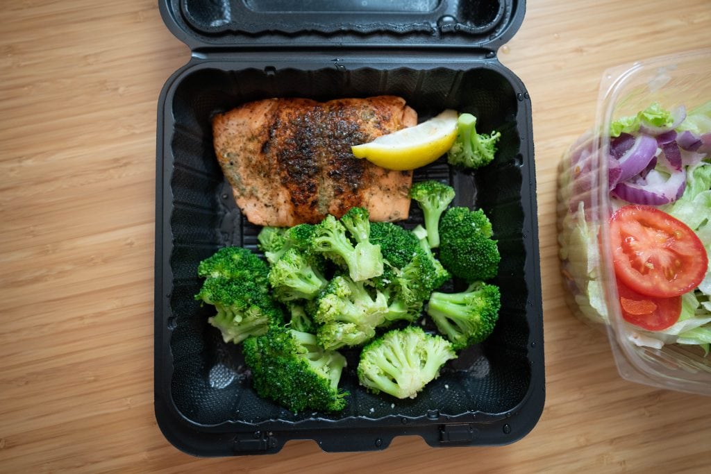 herb grilled salmon and vegetables close up