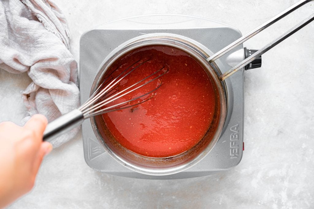 keto ketchup recipe ketchup simmering in a saucepan