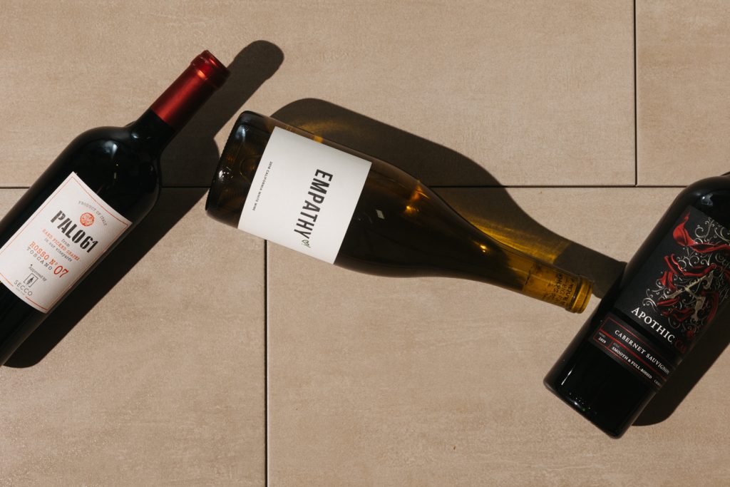 best wines for keto keto wine bottles arranged at random on a tile floor
