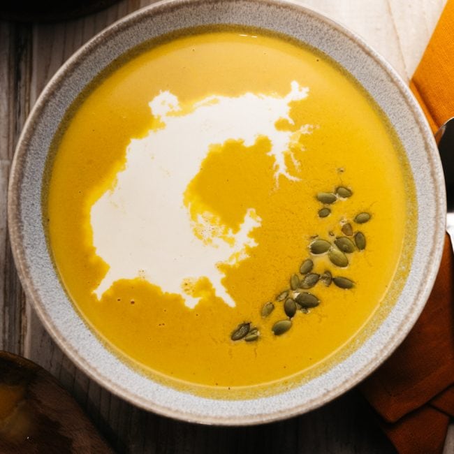 keto pumpkin soup bowl of keto pumpkin soup on a table