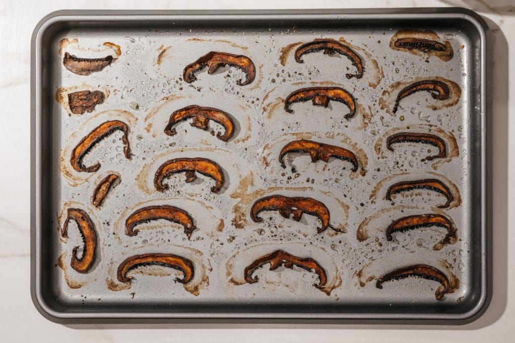 mushroom chips finished mushroom chips on a baking sheet