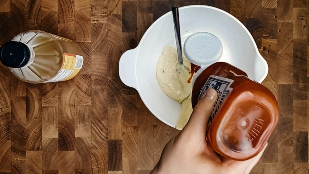 Adding ketchup into the mayo dressing base