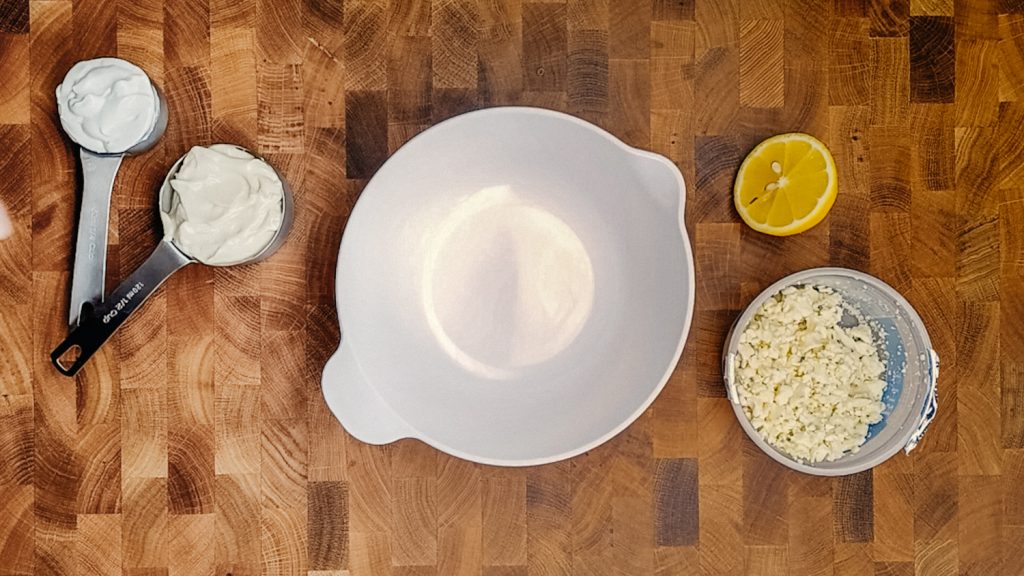 keto blue cheese dressing ingredients on a cutting board