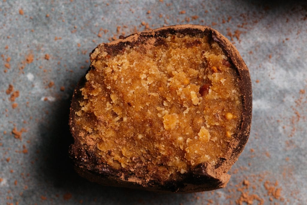 keto peanut butter balls bitten keto peanut butter ball close up