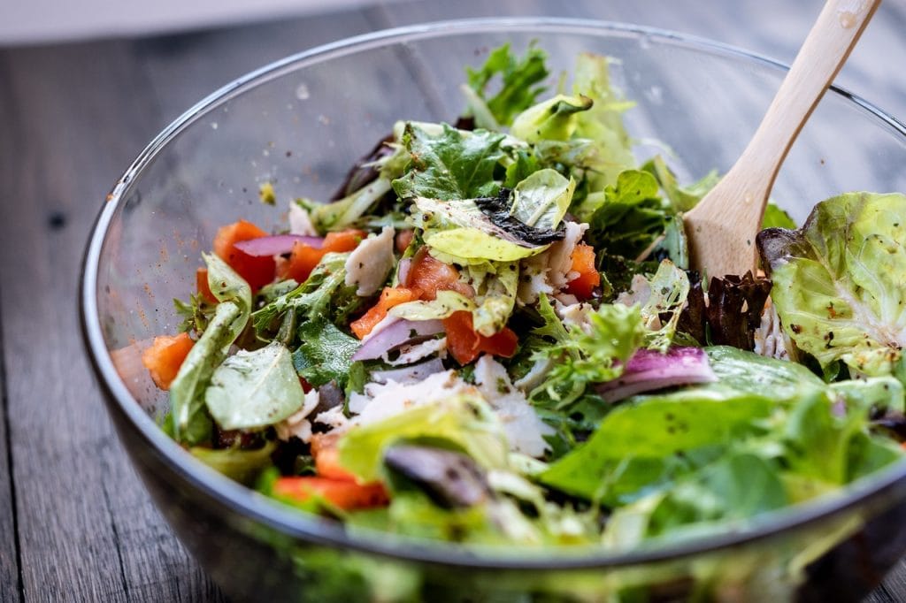 fresh vegetable salad in the glass bowl