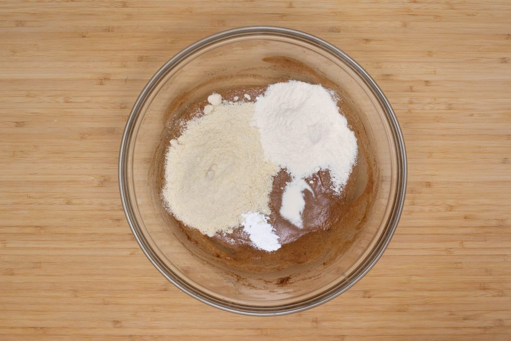 Keto Gingerbread Cookies adding dry ingredients to the gingerbread mixture