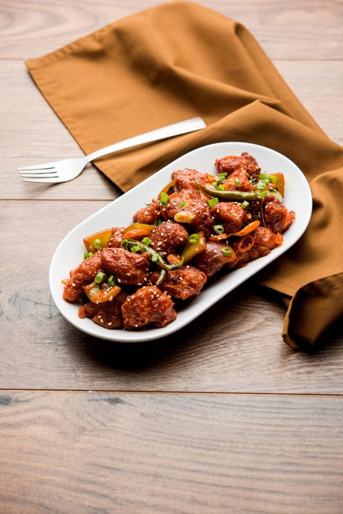 keto orange chicken low carb orange chicken served on the wooden board