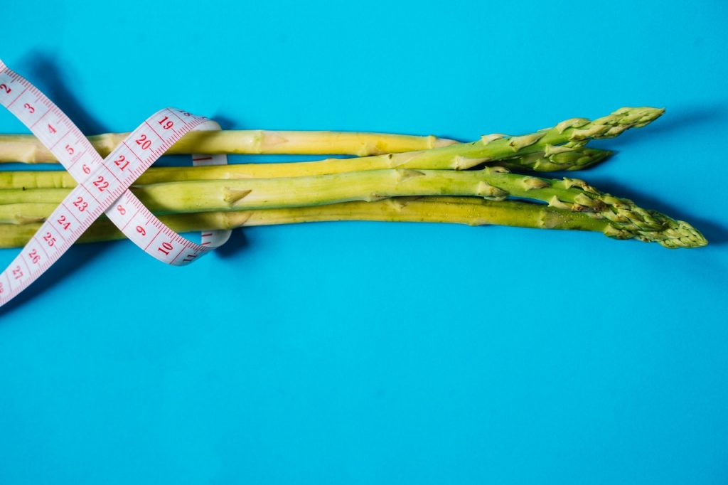 measurng tape around asparagus