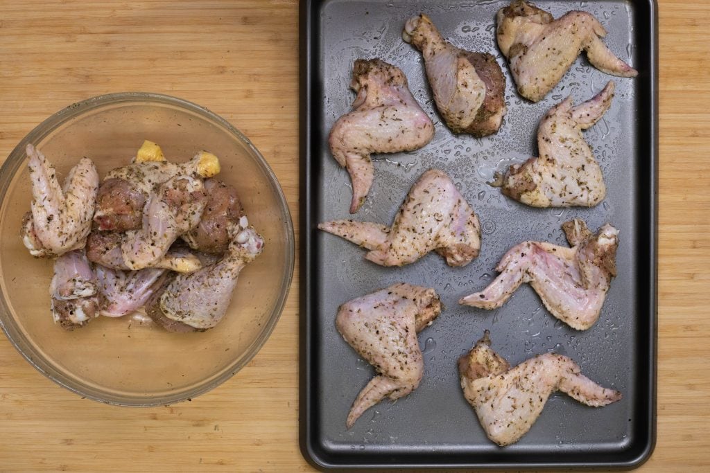 Preparing chicken wings for baking