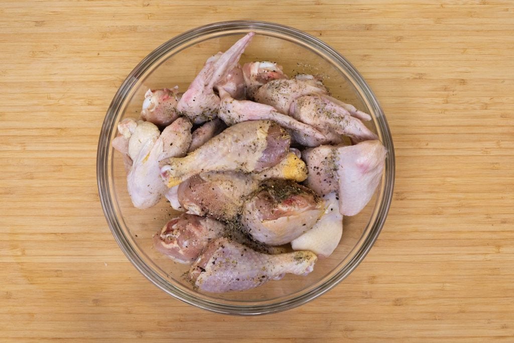 keto chicken wings Raw chicken wings in a bowl