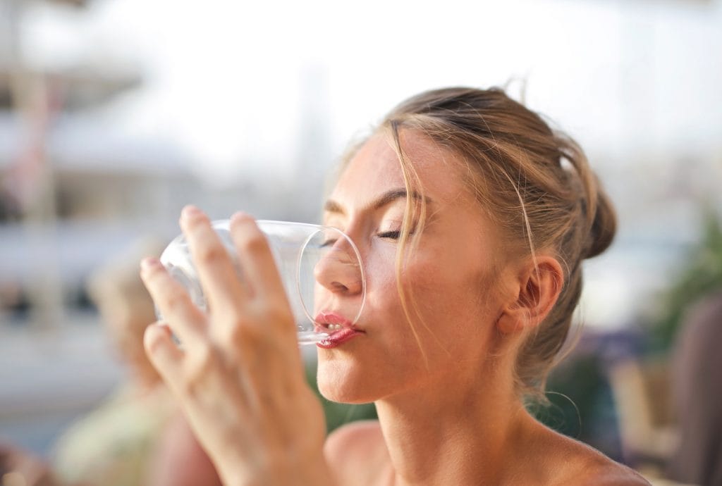 Keto Gum woman drinking water
