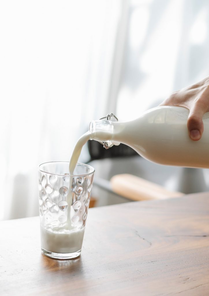 pouring whole milk